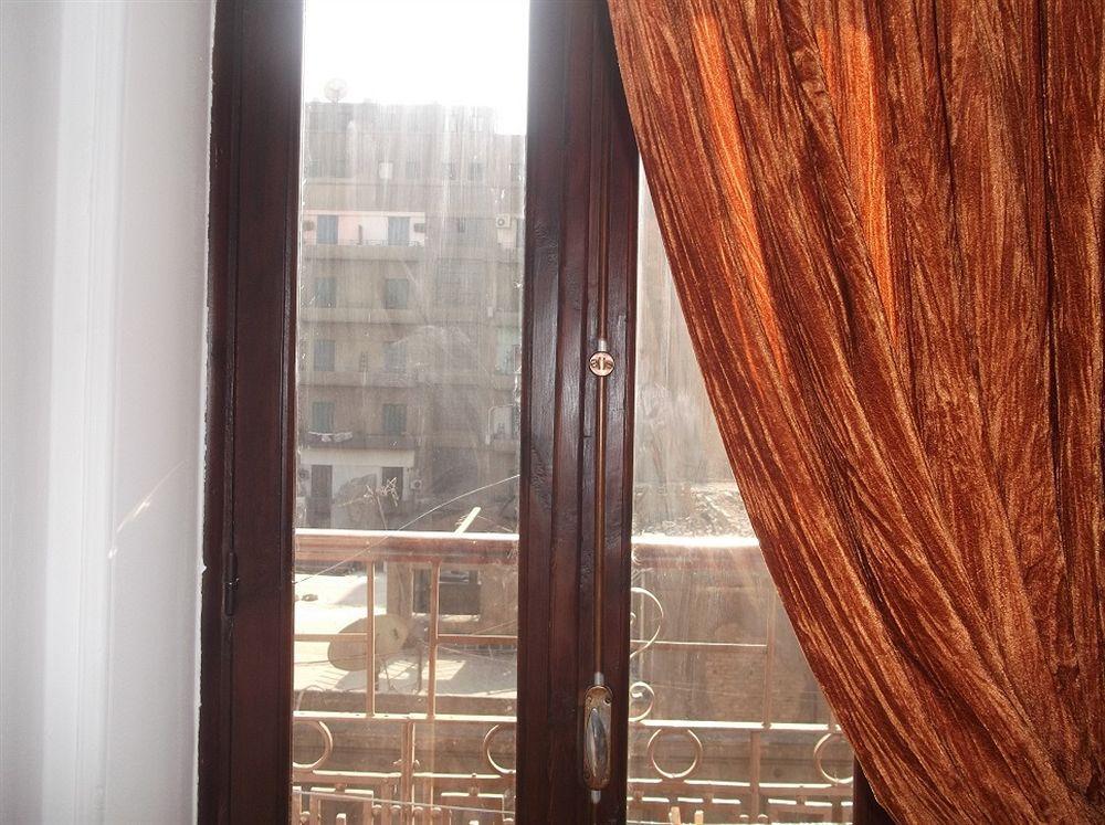 نزل القاهرةفي بيت شباب فاميلي بالاس المظهر الخارجي الصورة